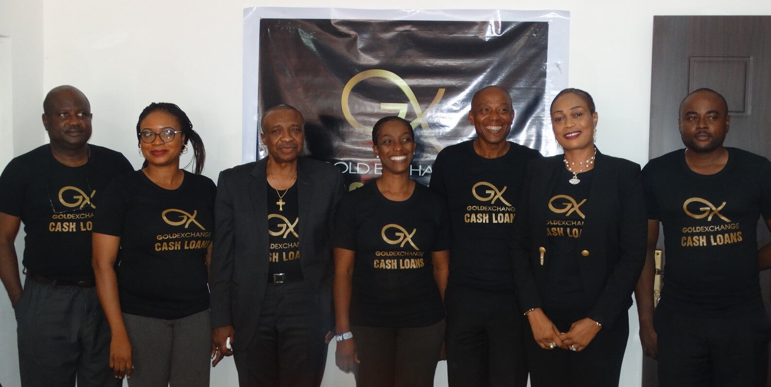 Assistant General Manager, Gold Exchange Limited, Mr. Bosun Awaye (left), Hon. Niyi Oyemade (third from left), Managing Director, Mr. Victor Okezie (third from right), the Chief Executive Officer and Managing Director, Sam & Sarah, Mrs. Folake Oyemade and other members of staff of Gold Exchange Limited, a pawn brokering company, at a press conference unveiling the company at its Victoria Island Office on Monday.
