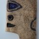 El Anatsui_Bomboy_1979_Manganese, clay and glass_31 x 24 cm